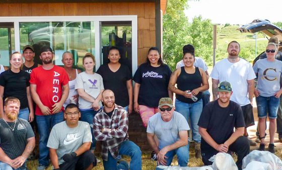 Members of the Washita-Custer County Treatment Court pose after an outdoor community service event.
