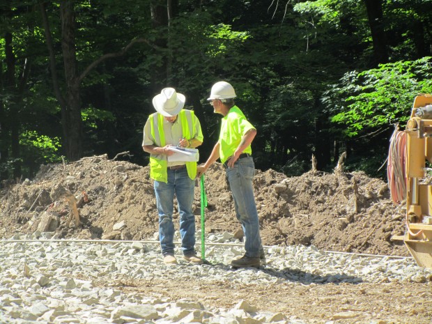 A "pipebender" from Texas oversees plans to lay a new gas pipeline in Susquehanna County. Workers prepare to lay pipe in Susquehanna County.