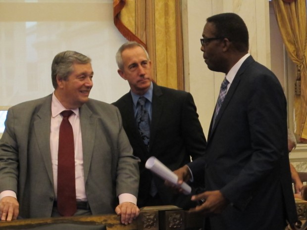 Philadelphia Energy Solutions CEO Phil Rinaldi, PGW CEO Craig White and City Council President Darrell Clarke share a moment at Philadelphia City Hall. 