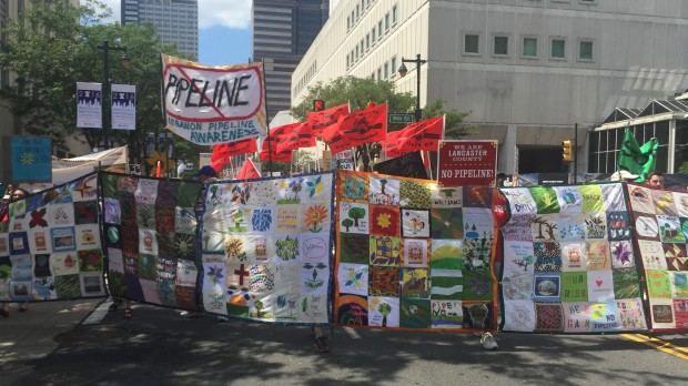 Thousands marched for clean energy and against fracking ahead of the Democratic National Convention in Philadelphia Sunday afternoon.