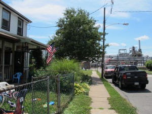 A street in the borough of Marcus Hook, Delaware County with the Sunoco refinery in the background. Mariner East supporters say the new pipeline will help keep jobs in the area.
