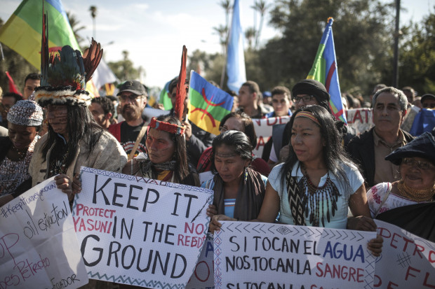 Hundreds protest against climate change and urge world leaders to take actions, in a march coinciding with the Climate Conference, known as COP22, taking place in Marrakech, Morocco, Sunday, Nov. 13, 2016. 