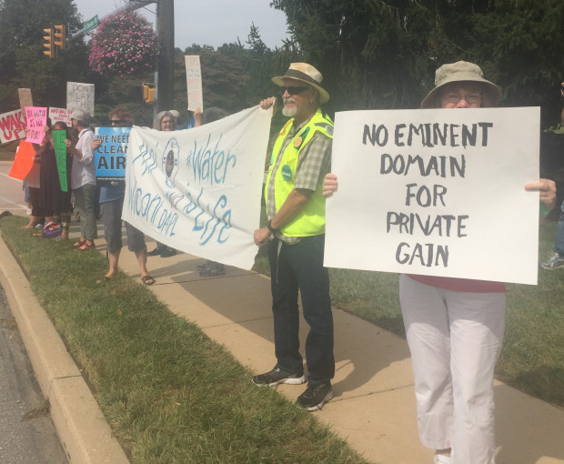 Protesters outside of Sunoco headquarters in Newtown Square. Landowners along the route and anti-pipeline activists are preparing lawsuits to challenge any permits issued by DEP.