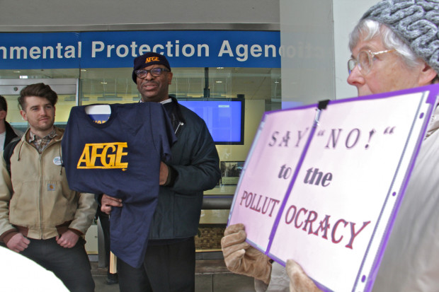 Gary Morton, president of the American Federation of Government Employees Local which represents EPA workers, joins protesters outside the agency's Center City offices. 