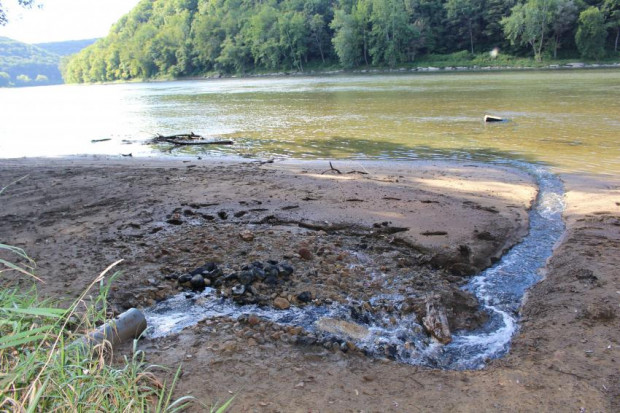 Treated oil and gas wastewater flows into a western Pennsylvania stream. (Photo: Avner Vengosh, Duke)