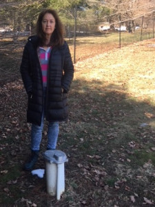 Rosemary Fuller, of Media, stands next to the private water well that she fears will be contaminated when Sunoco drills for the Mariner East pipelines.