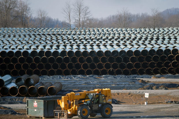 Along U.S. Route 19 in southern West Virginia, row after row of pipe is stockpiled in preparation for construction of the 300-mile Mountain Valley Pipeline, one of several major natural gas pipelines that will crisscross the state as the industry booms. 