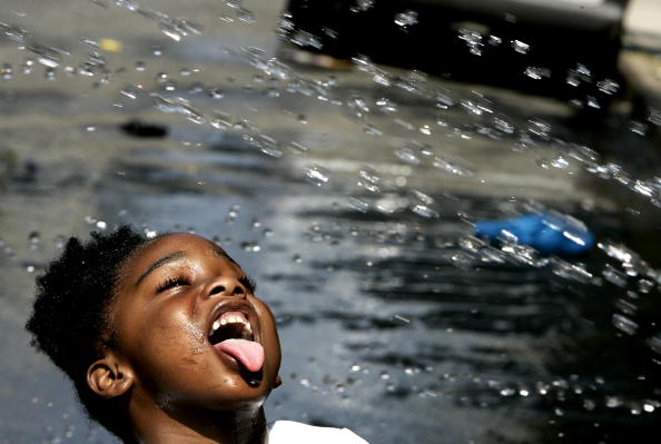 black kid sticking tongue out