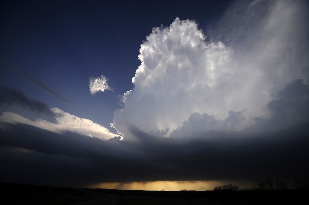 A SUPERCELL STORM WEST OF NEW CASTLE, TEXAS TRIES TO BUILD UP STRENGTH ...