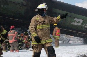 Firefighters train to battle a crude oil train wreck. 