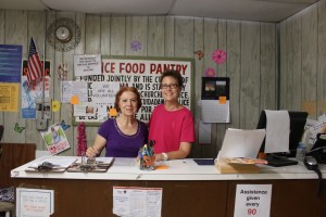 Penny Gordon and Bonnie Whitley work at the Food Pantry. 